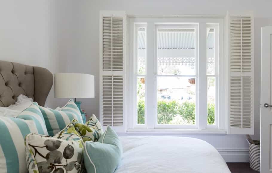 white-plantation-shutters-in-tampa-bedroom
